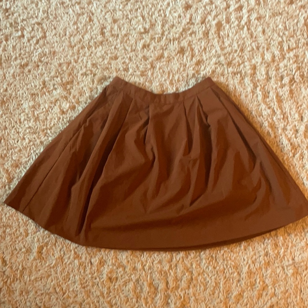 Full skirt with pockets.